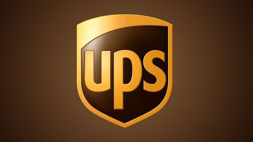 UPS logo on a brown background, representing shipping services.