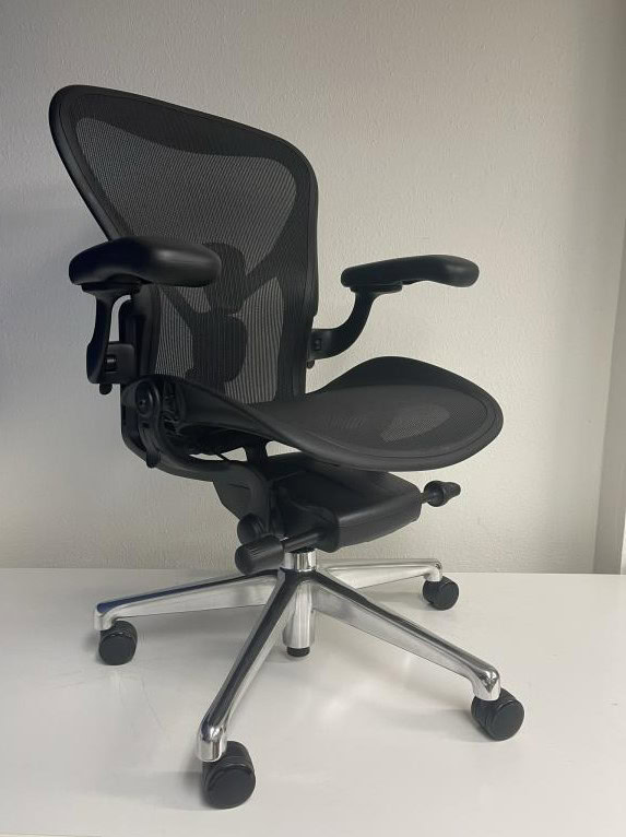 Ergonomic mesh office chair with adjustable height and lumbar support.