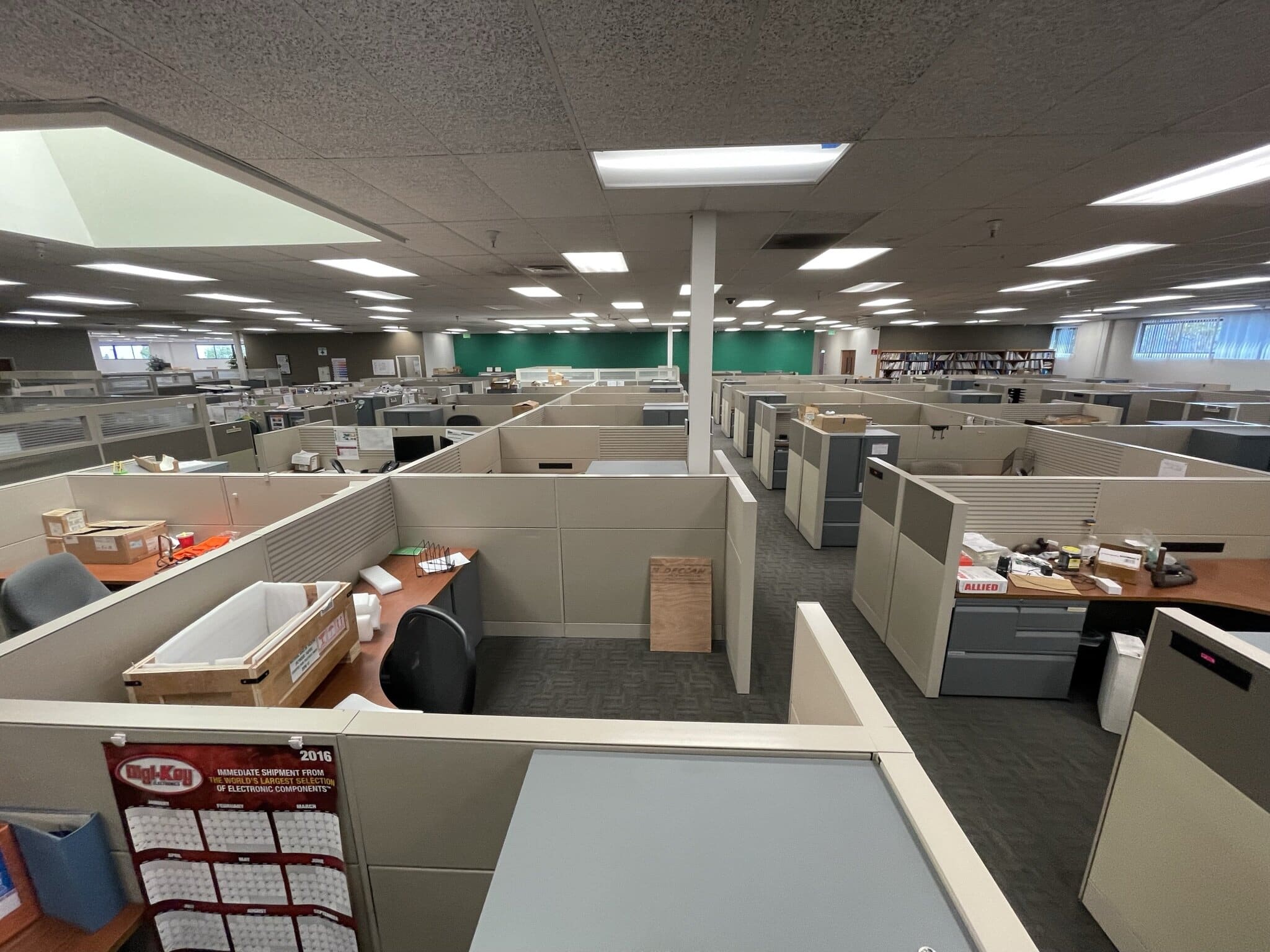 Office furniture liquidation with cubicles and desks for sale.