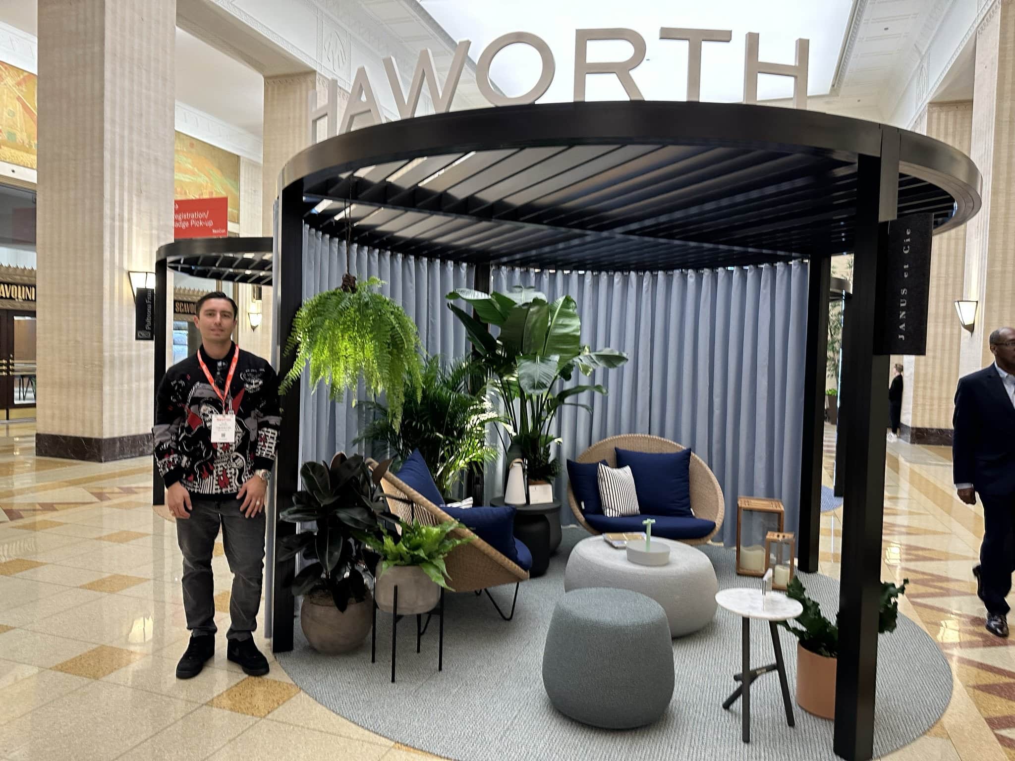 Commercial Brokers, Dealers, and Partners booth showcasing innovative cube-shaped lounge area.