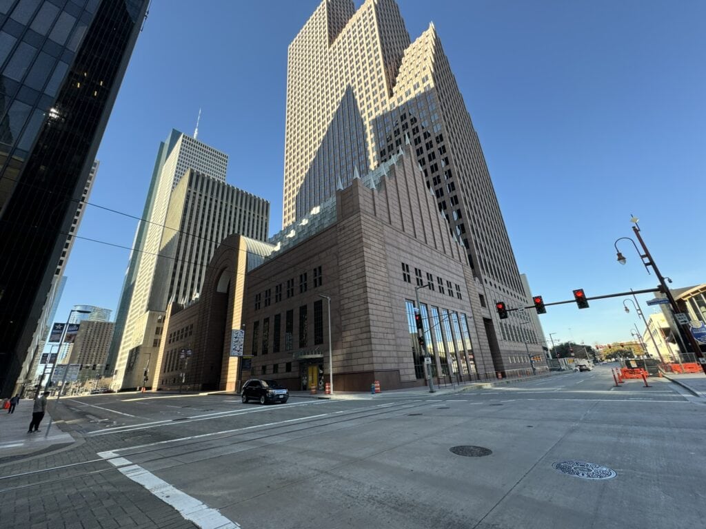 Downtown skyscrapers in a cityscape with modern high-rise buildings.