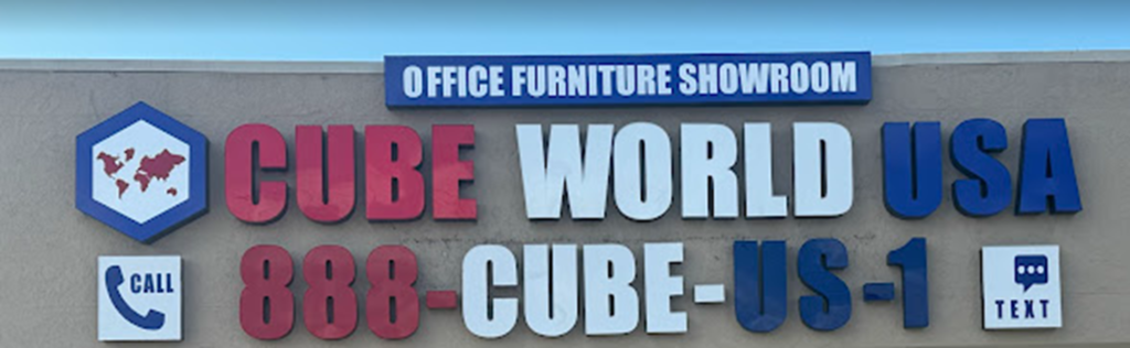 Office furniture showroom sign for Cube World USA with contact info.