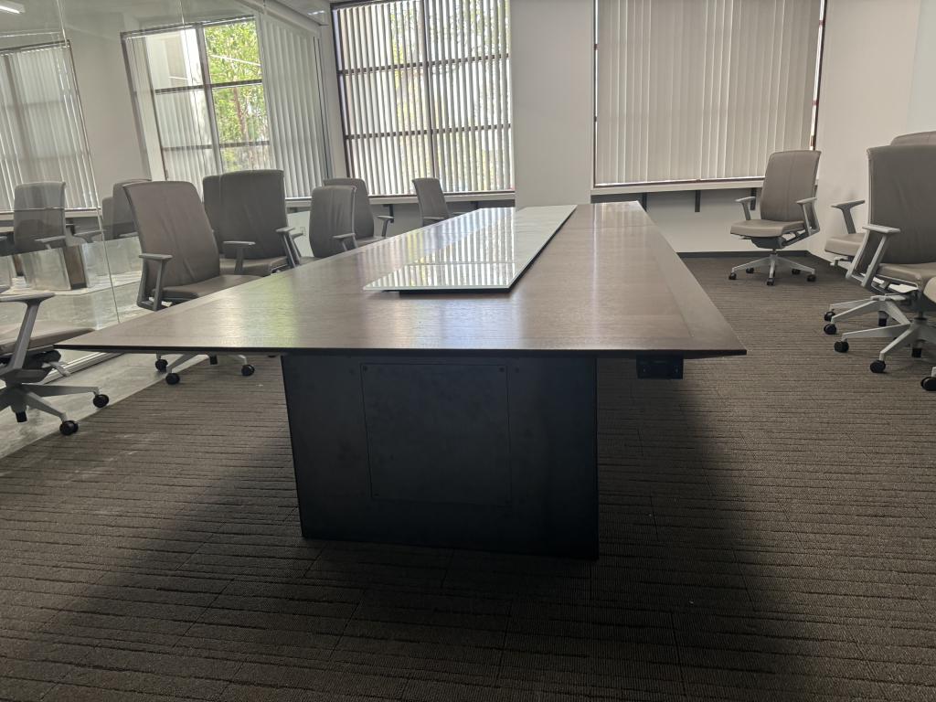 Veneer Espresso electric and glass conference table in a contemporary office setting.