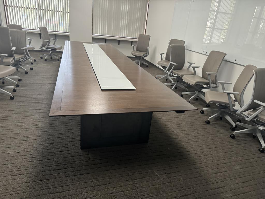 Veneer Espresso electric and glass conference table in modern office setting.