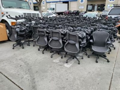 Office chairs and cubicles available for liquidation and office space optimization.