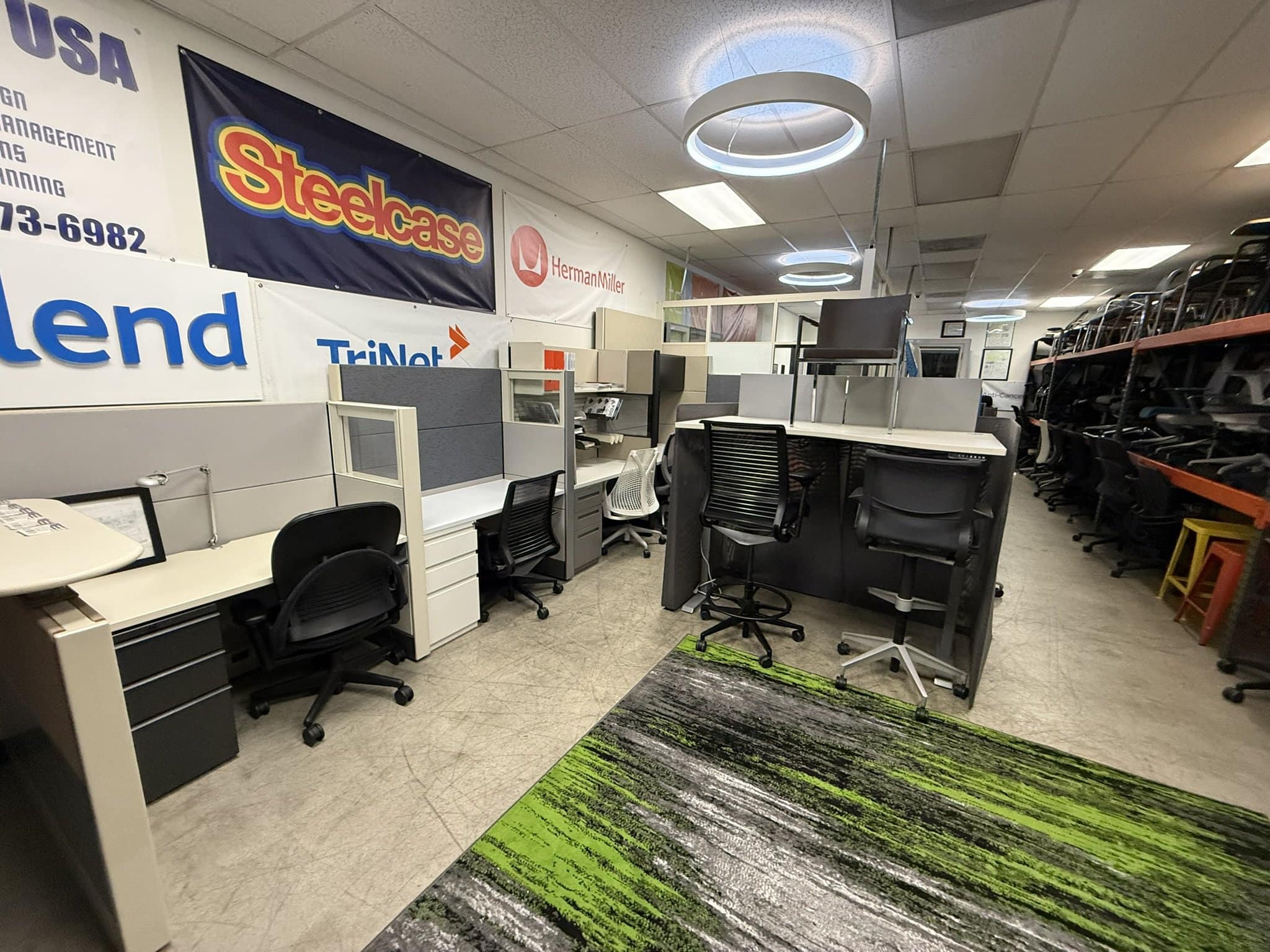 Modern office desks and chairs available for rent at Cube World USA.