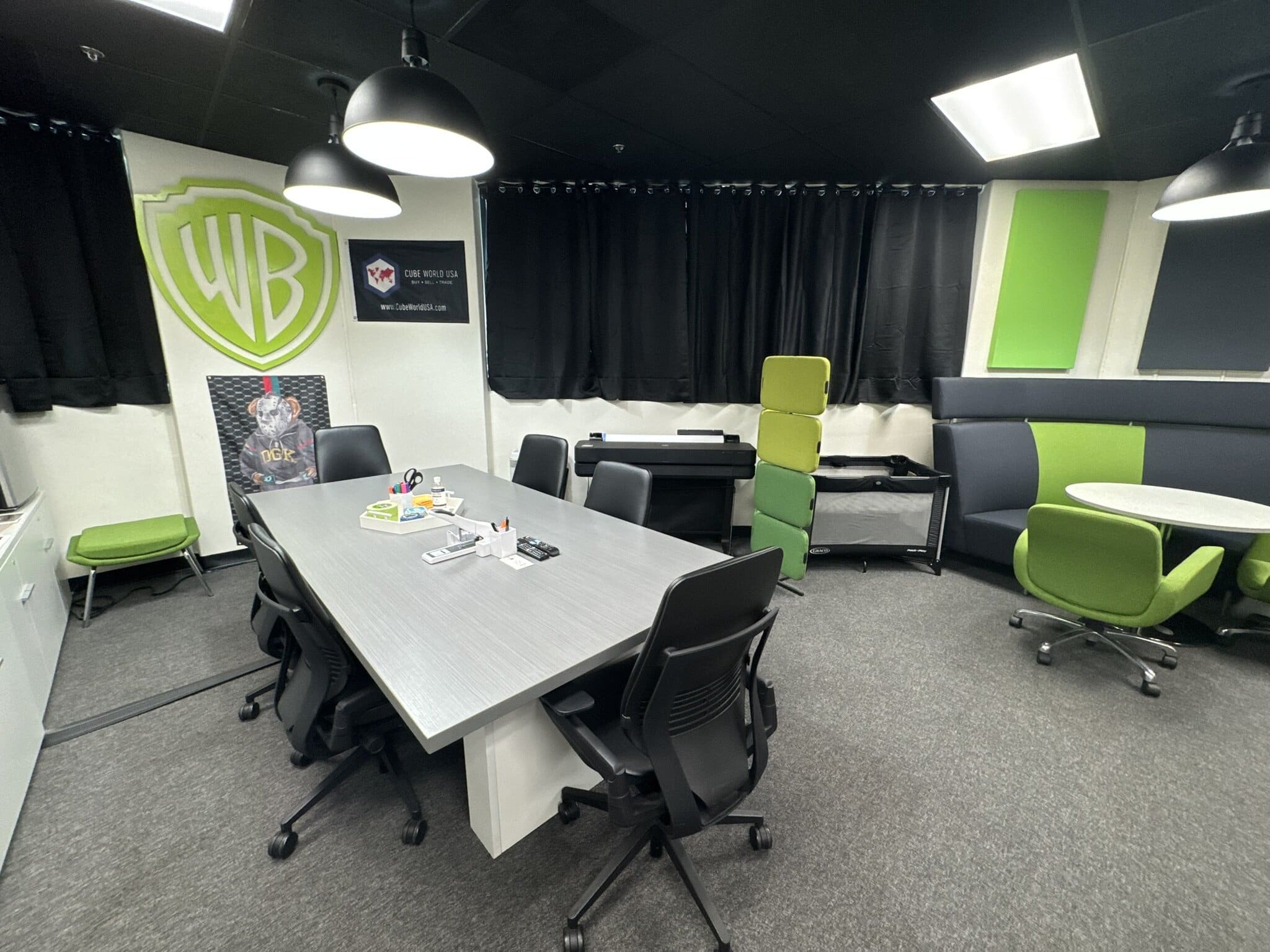 Modern office furniture setup with chairs, tables, and lounge areas.