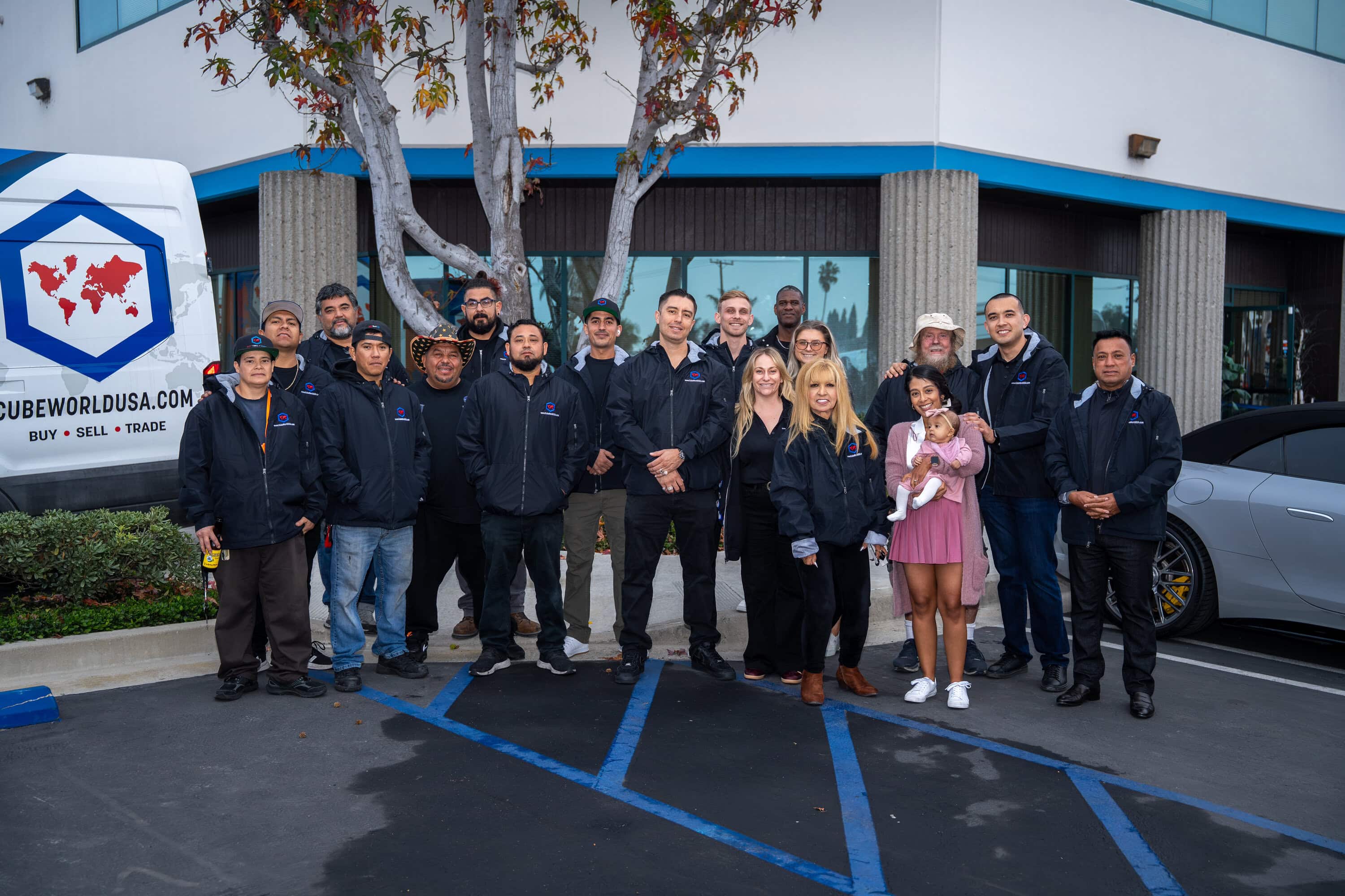 Commercial brokers and partners at Cube World USA dealership.